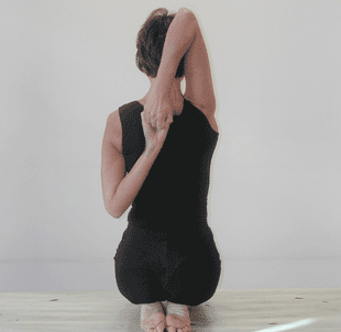 gomukhasana in vajrasana